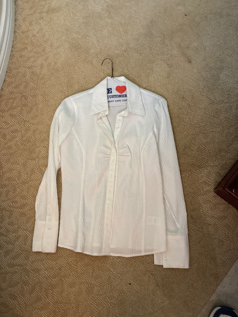 Woman’s white fitted blouse